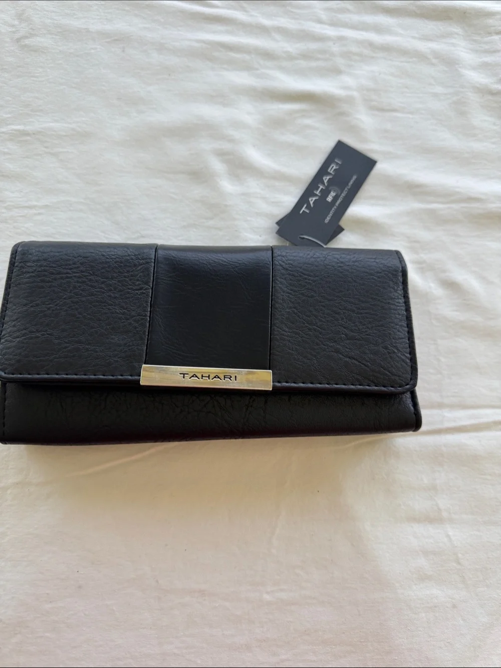 Tahari Black Wallet. RFID ID protection. Vegan Leather. Size 8”x4”